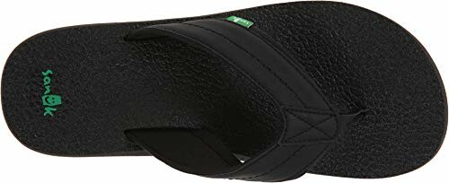 Black flip flop sandal with textured sole and green logo